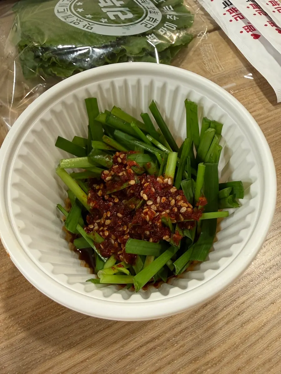 Generous serving of chive salad alongside jokbal