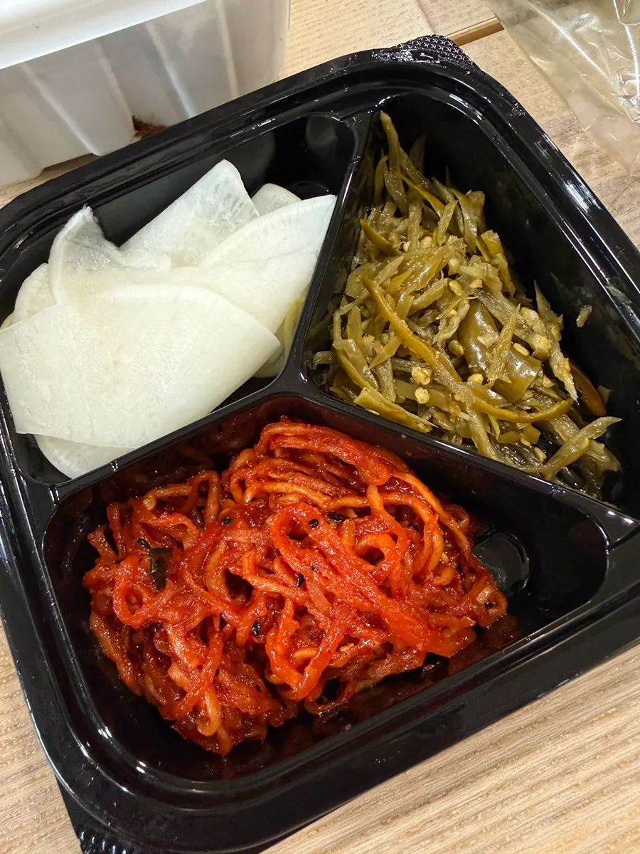 Pickles and radish kimchi served together
