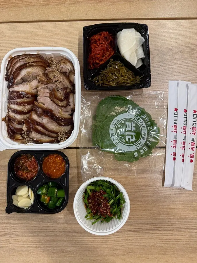 A full jokbal spread set up at home from Cheongmigwan