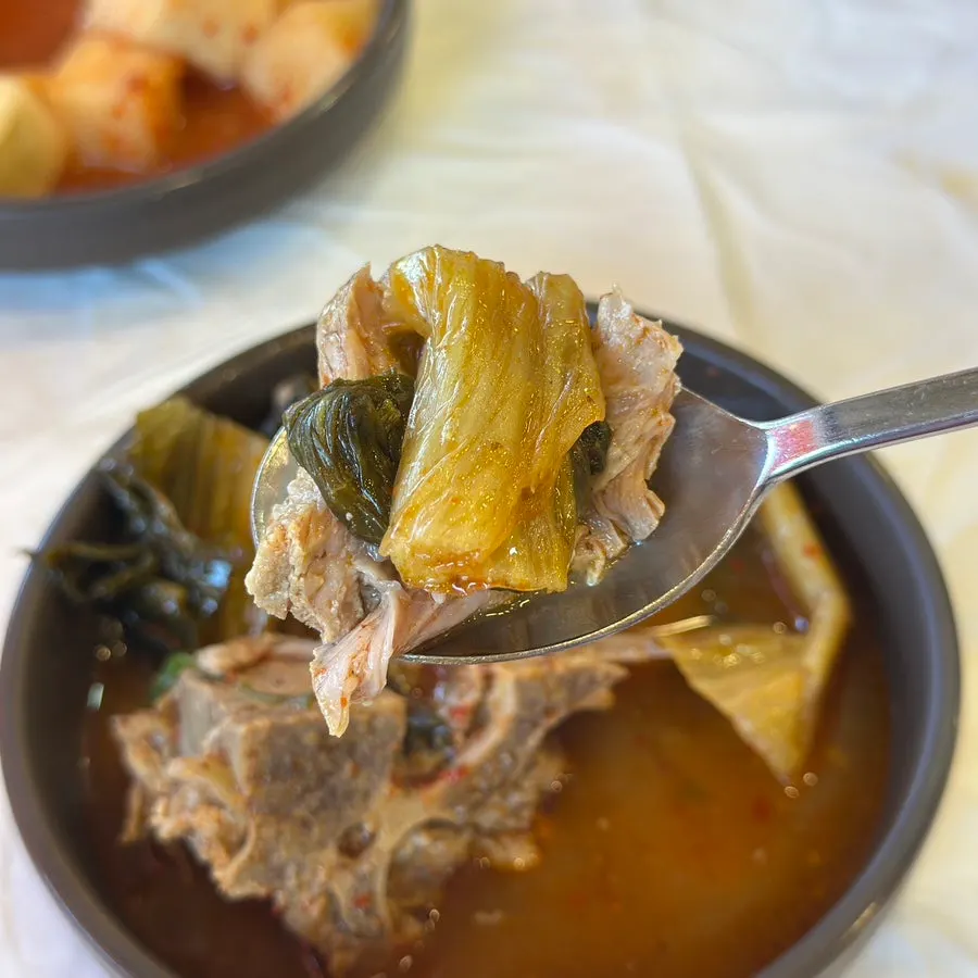 Gamjatang and ugeoji in a small bowl