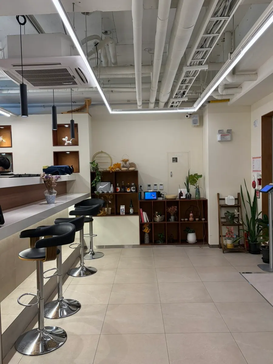 Interior of Sushi Resto with wood-tone decor