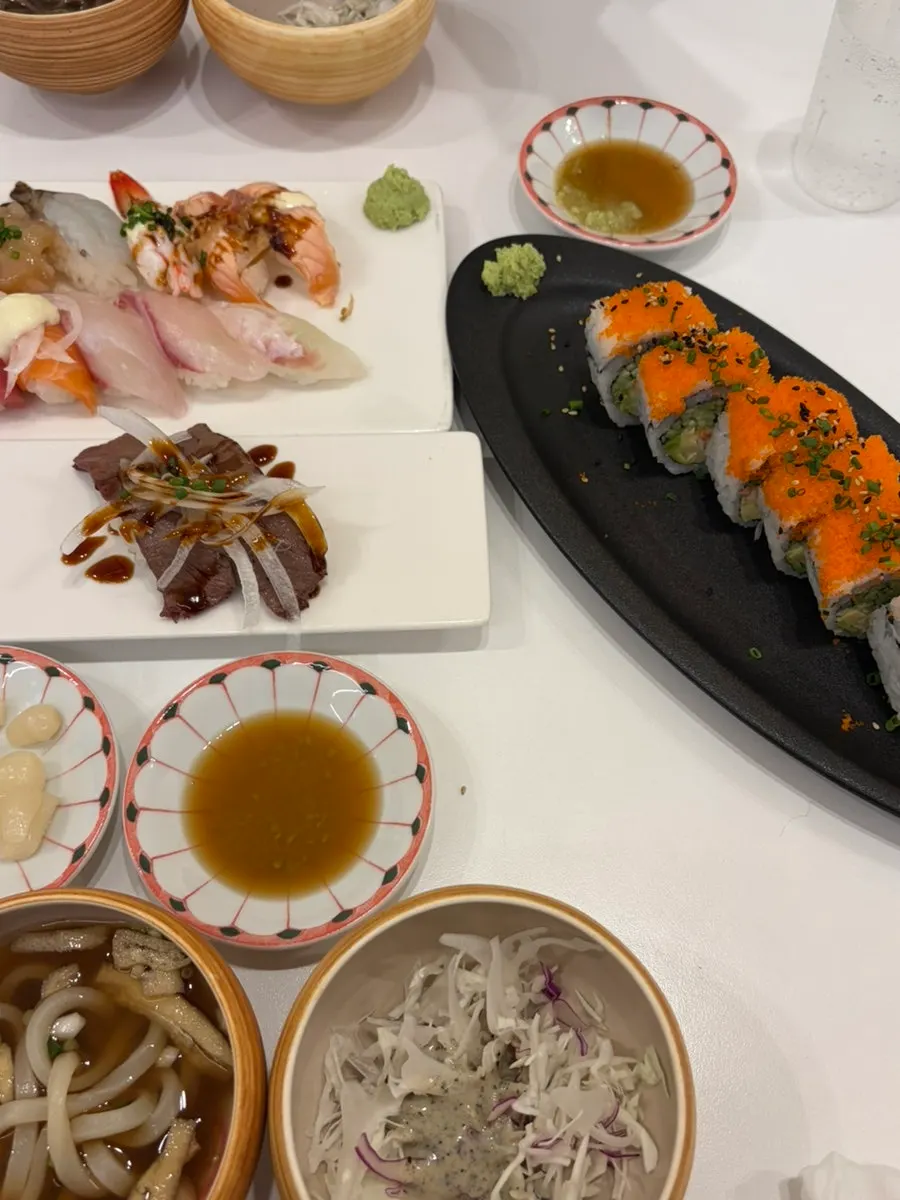 Sushi and rolls placed together on the table