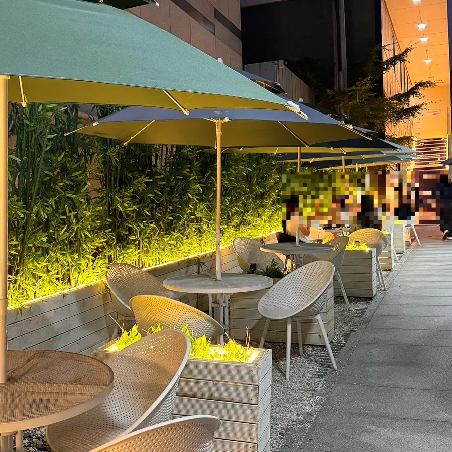 Outdoor seating in front of the Selected Nicks entrance