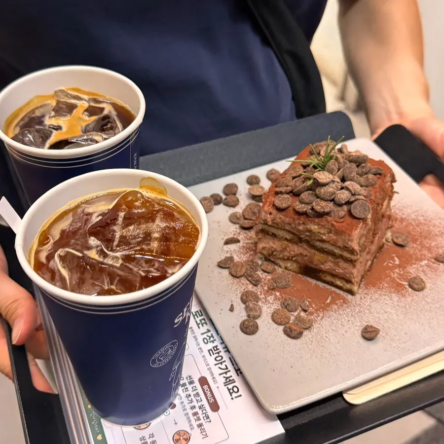 Self-service water and straw corner beside the counter