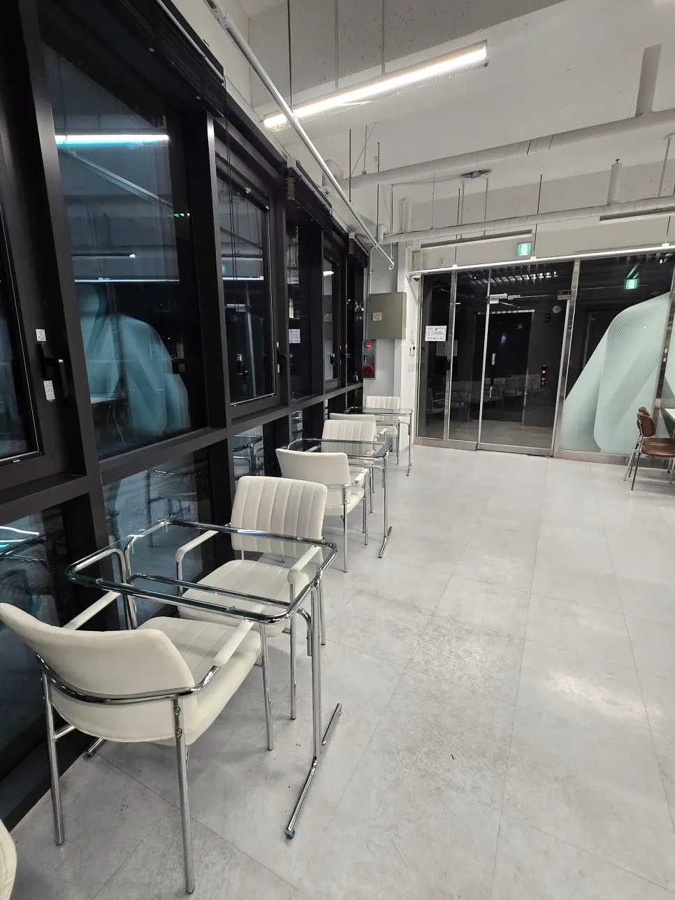 3rd-floor lounge with white-toned seating