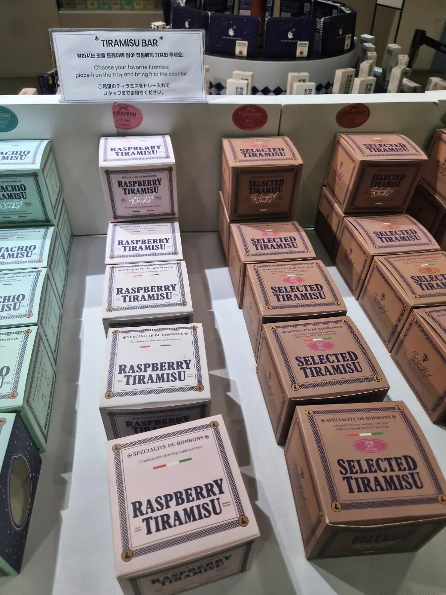 Various types of tiramisu displayed in the showcase