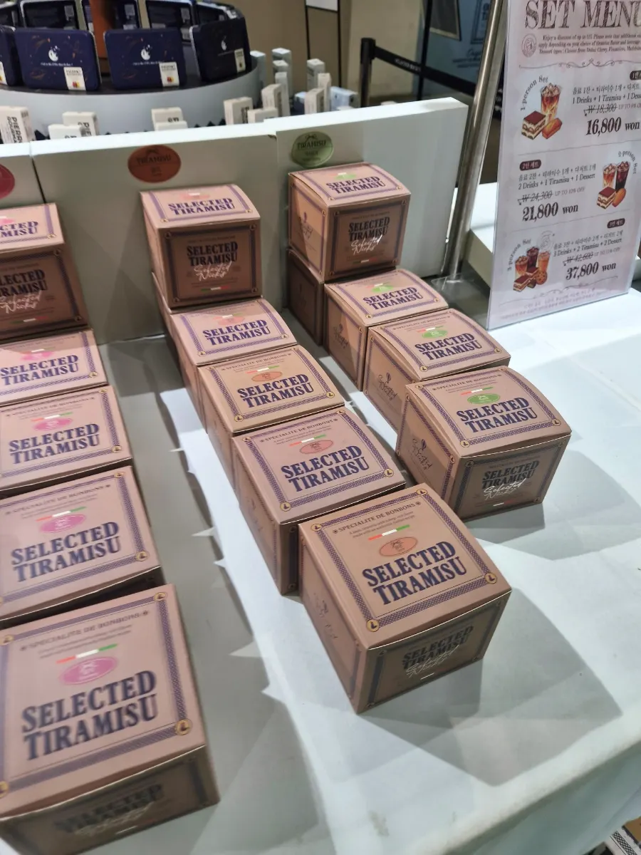 Banana pistachio and Dubai chocolate tiramisu on display