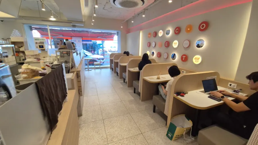 Seating arrangement with bar tables and sofa tables