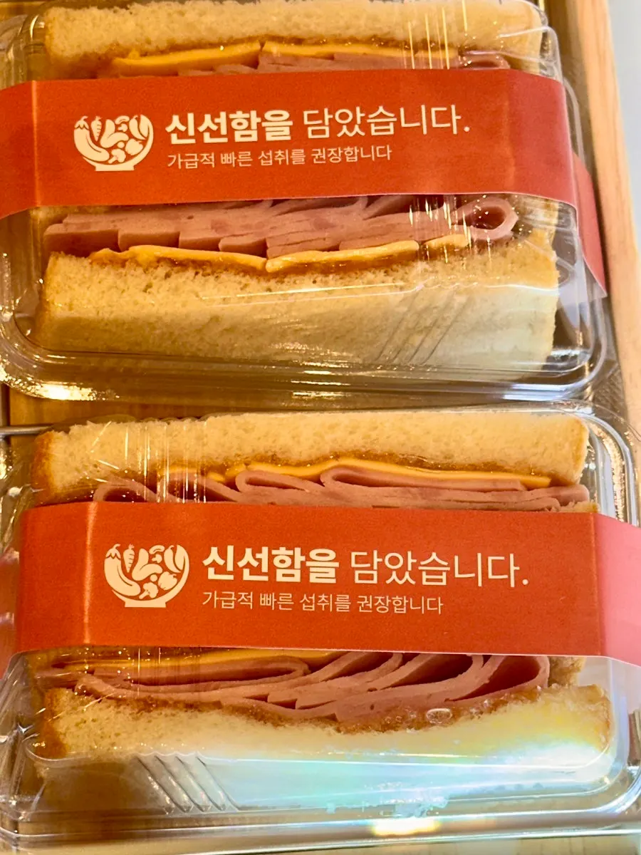 Display case with generously filled sandwiches