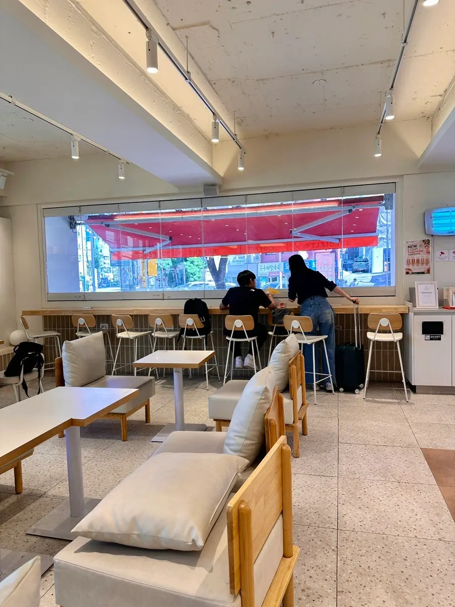 Main lounge with bar tables and window seats