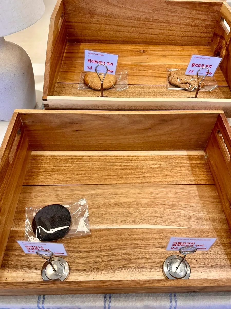 Choosing bread inside the café