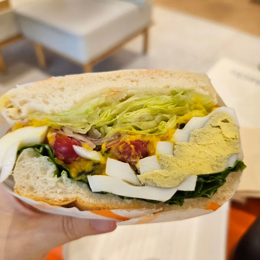 Cross-section of the pumpkin egg sandwich with pumpkin mousse and egg