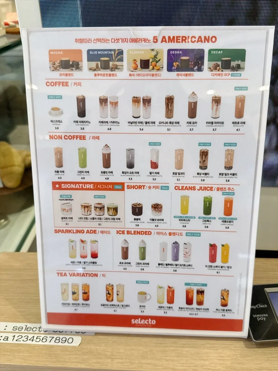Menu board featuring bagels and sandwiches