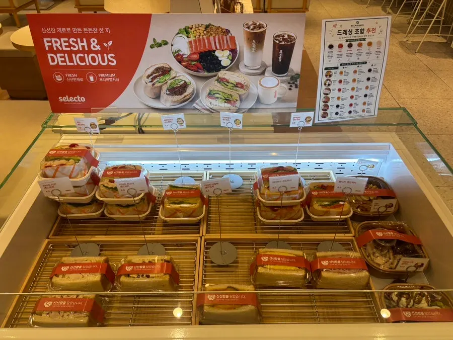 Display case with bread and cake