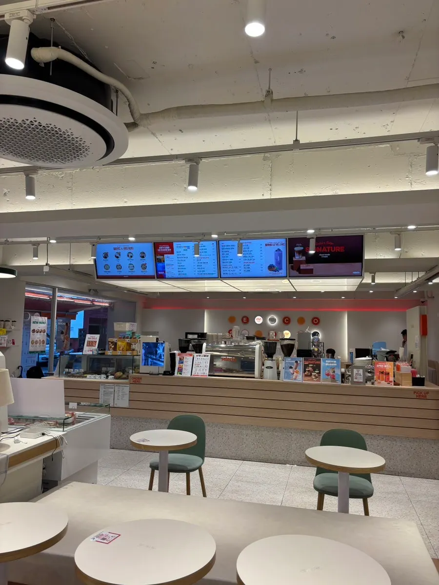 Spacious seating arranged throughout the café interior