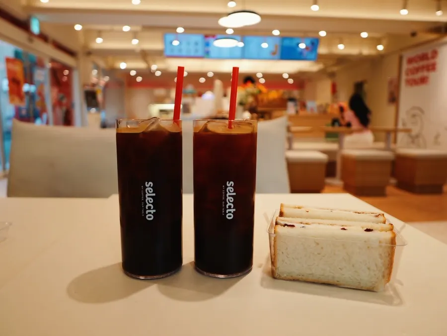 Geisha and mocha blend iced americanos with a ricotta cheese sandwich