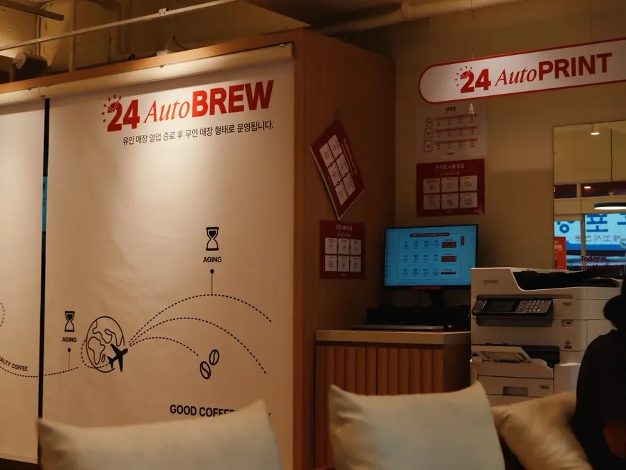 Signage for staffed and unstaffed hours with convenience foods on display