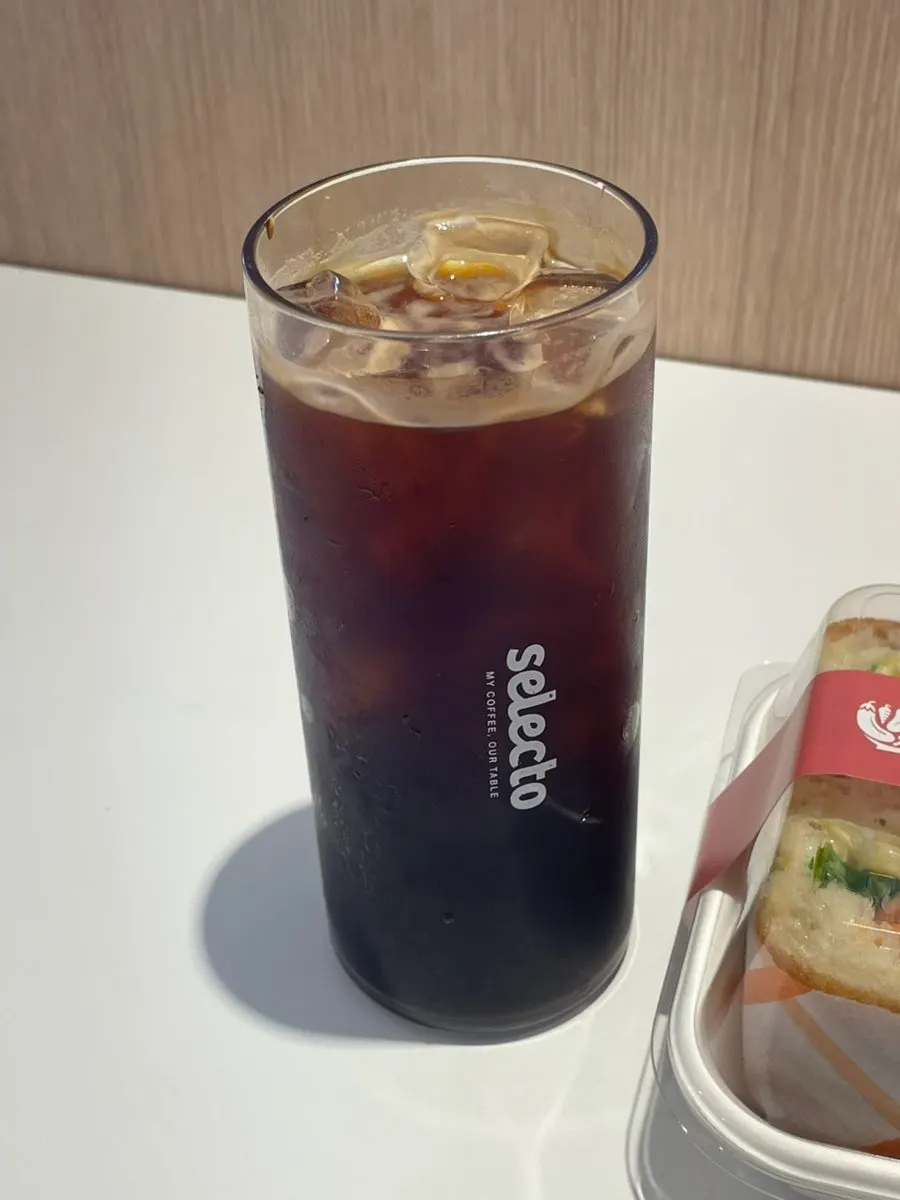 A cup of mocha-bean americano