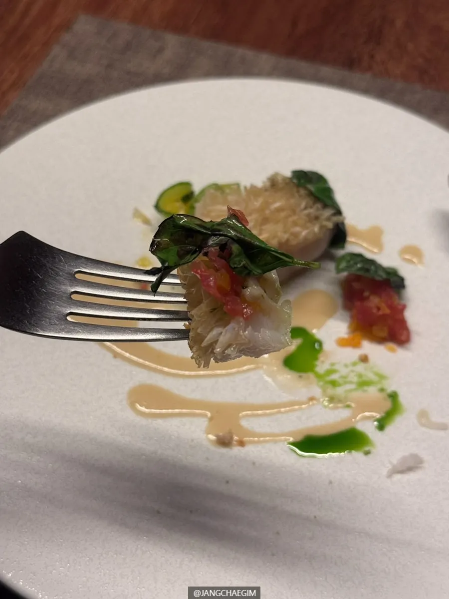White tilefish with vermouth sauce and garnish