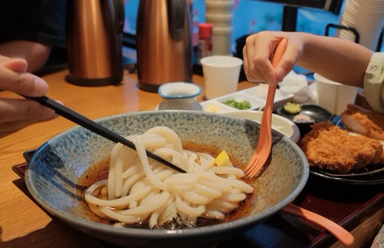 Bukkake udon mixed with soy sauce