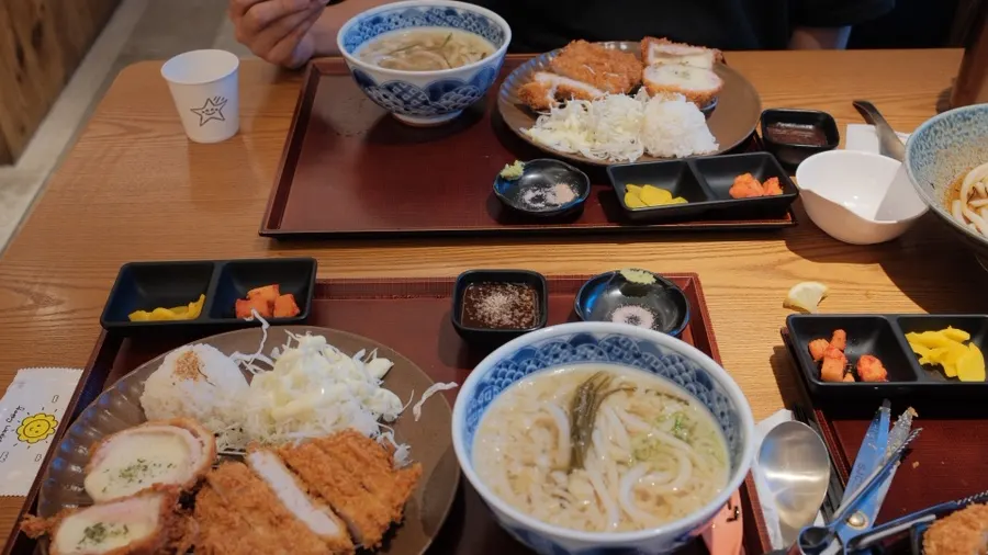 A hearty dinner spread of tonkatsu and udon