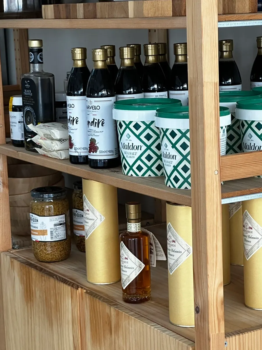 Shelf of olive oil and balsamic glaze