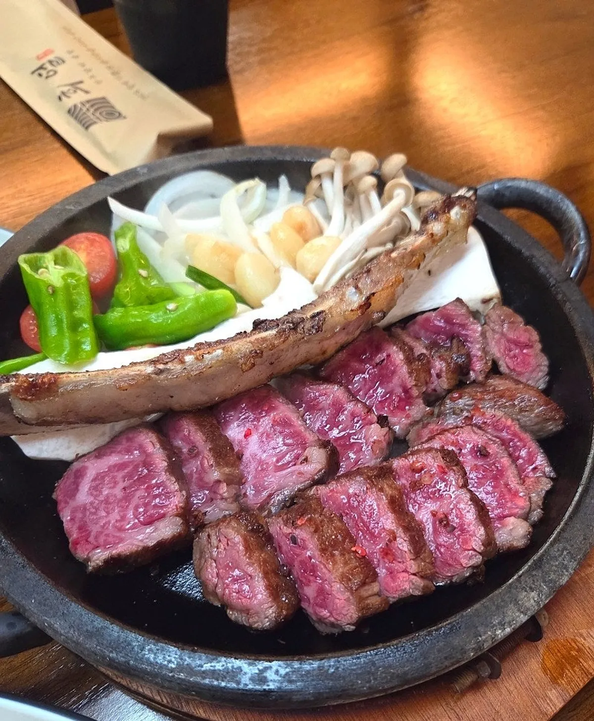 Table set with the grilled set and hot pot rice