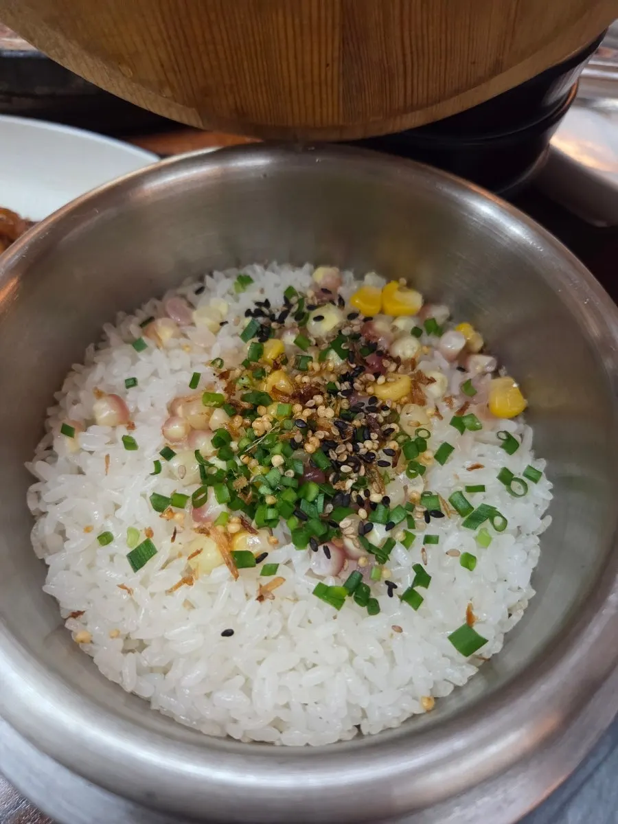 Seasonal hot pot rice with fresh corn