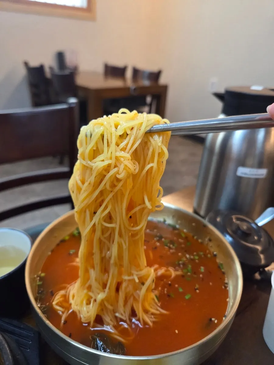 Close-up of gat kimchi and noodles