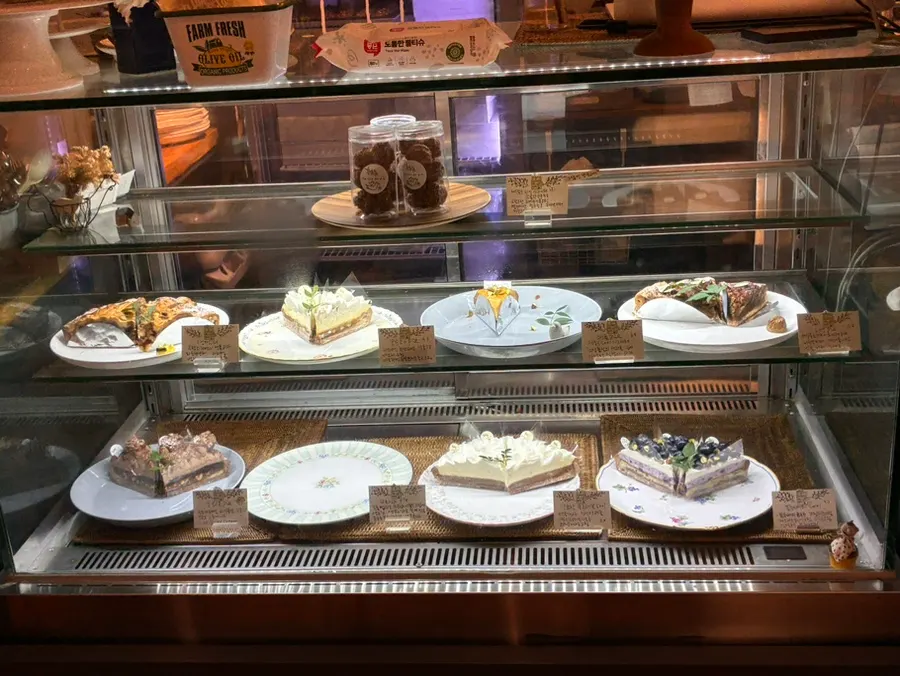 Assorted pies displayed in the showcase