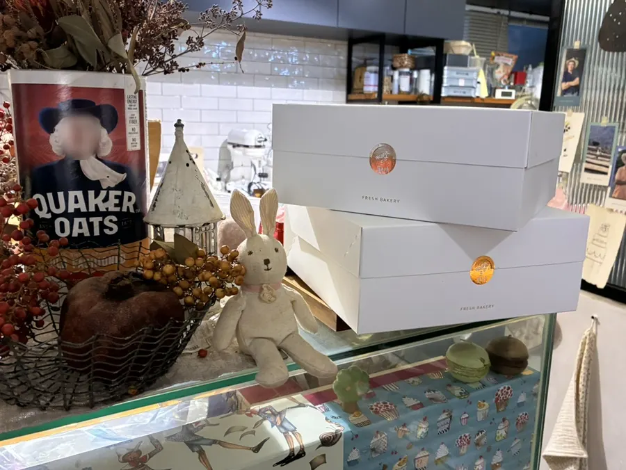 Pie display case while deciding what to choose