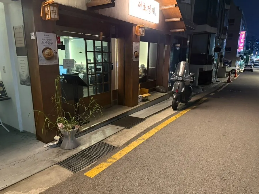 Yellow-line parking space in front of the store