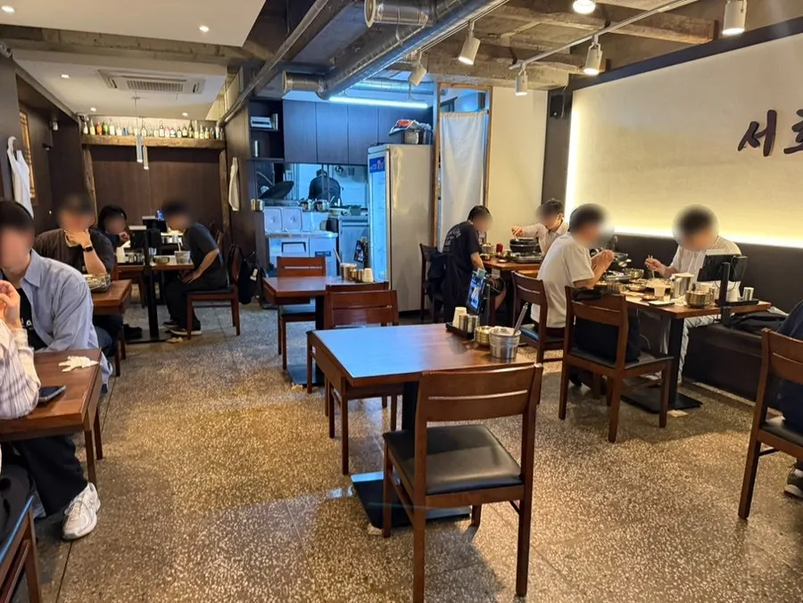 Softly lit interior of Seocho Jeonggye