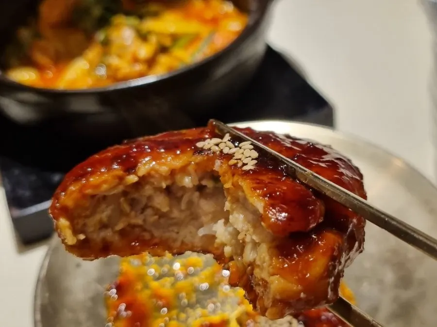 Dak-bokkeumtang served with side dishes at Seocho Jeonggye