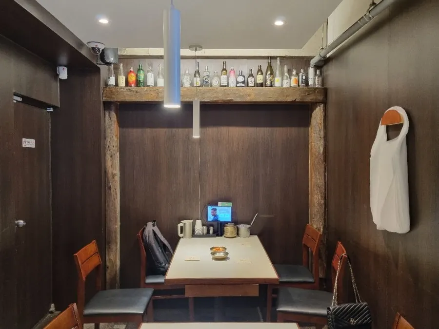 Clean, cozy seating area inside Seocho Jeonggye