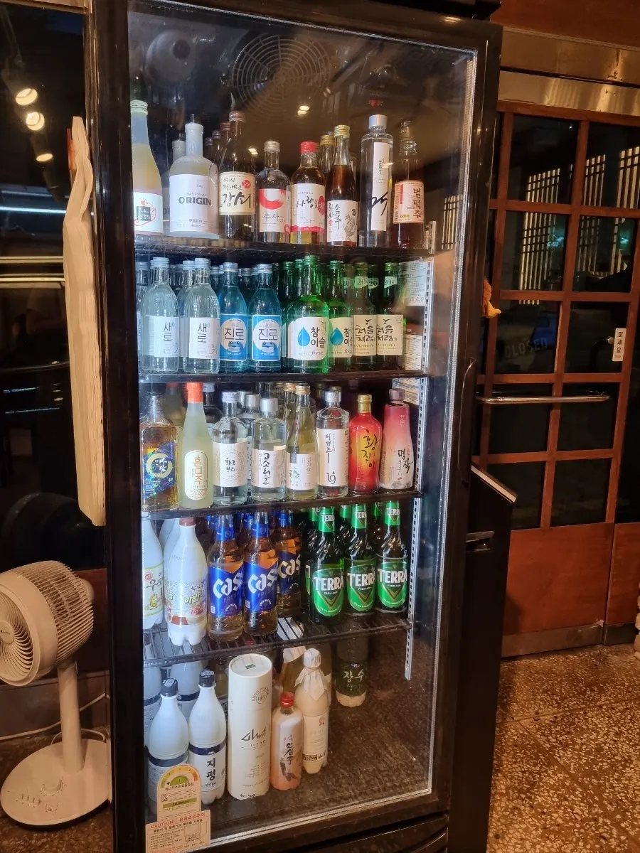 Menu board listing solo dishes at Seocho Jeonggye