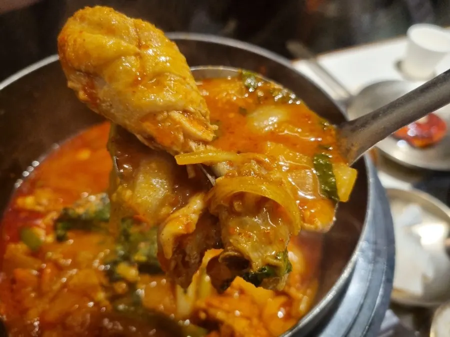 Close-up of dak-bokkeumtang coated in sauce