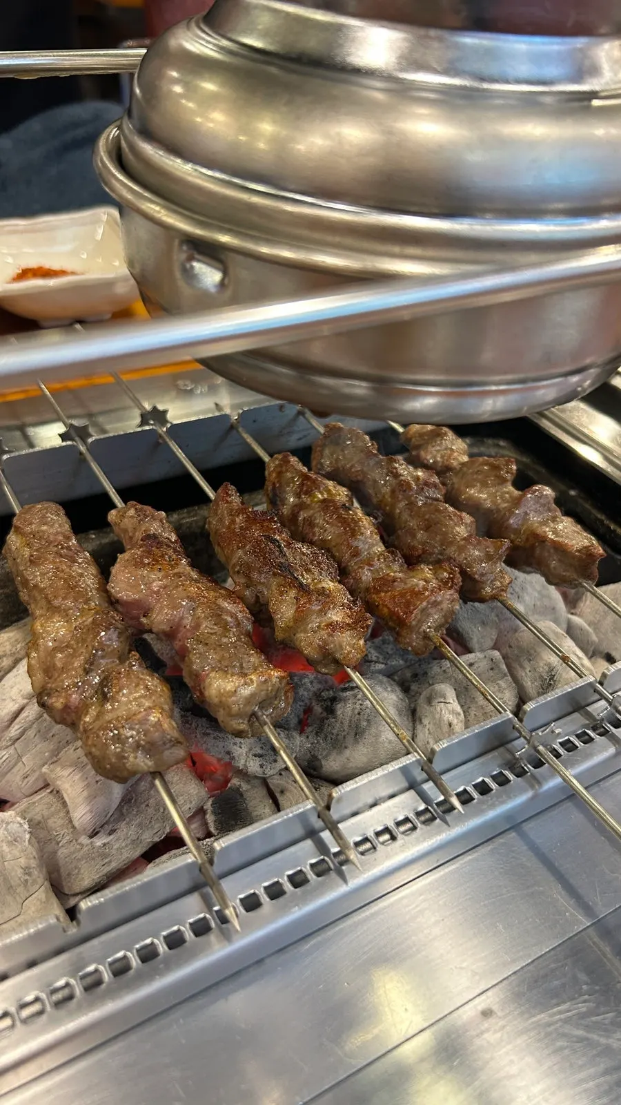 A piece of thin-battered fried eggplant