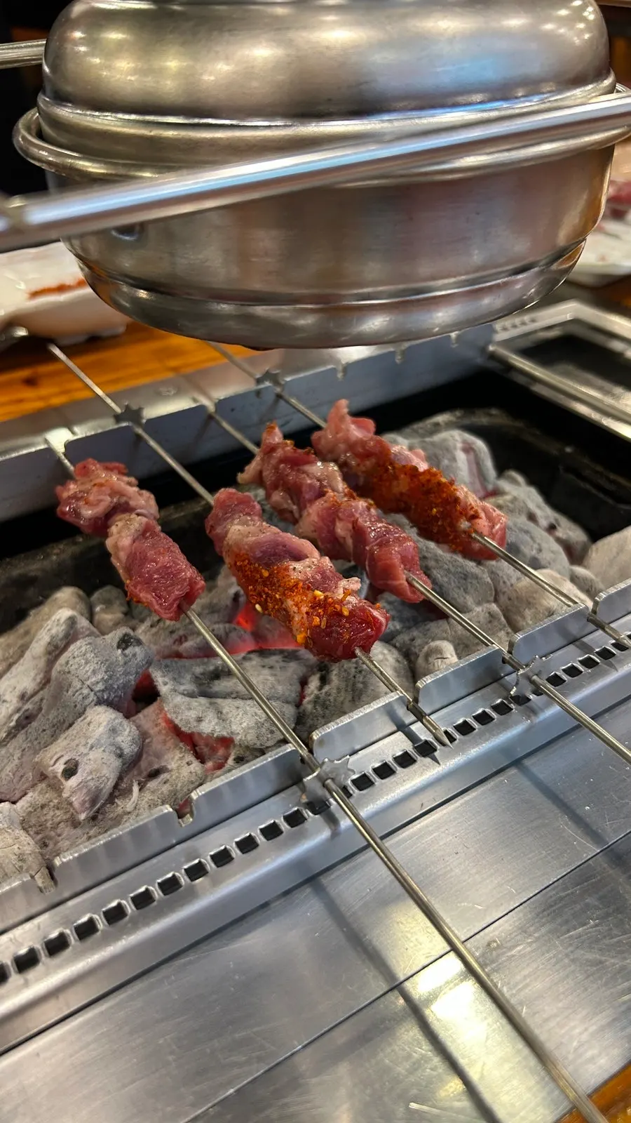 Fully grilled lamb skewers with cumin powder