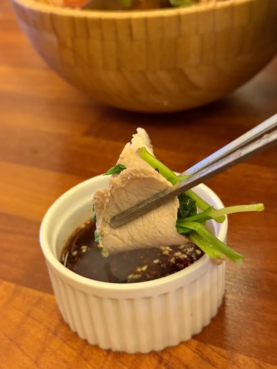 Close-up of onsuyuk bossam meat and broth