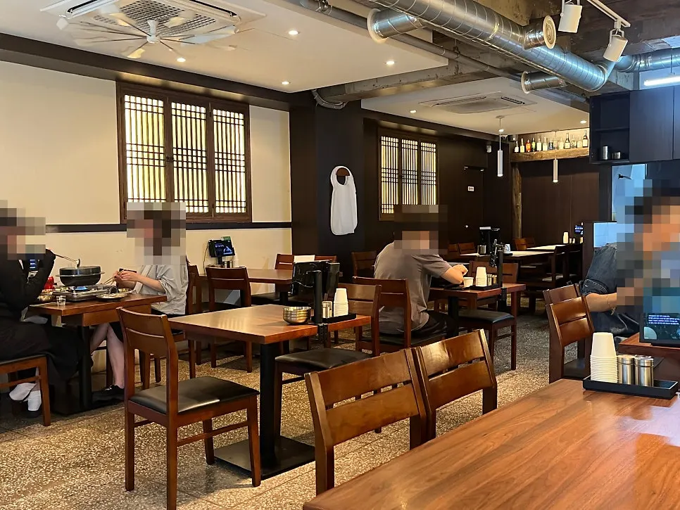 Interior of Seocho Jeonggye with widely spaced tables