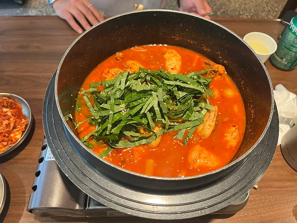 Dakbokkeumtang simmering over the flame at Seocho Jeonggye