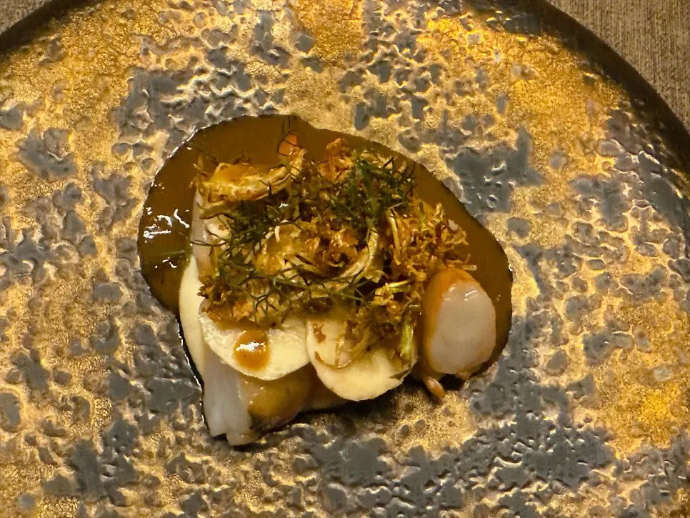 Shrimp dish served with bisque sauce