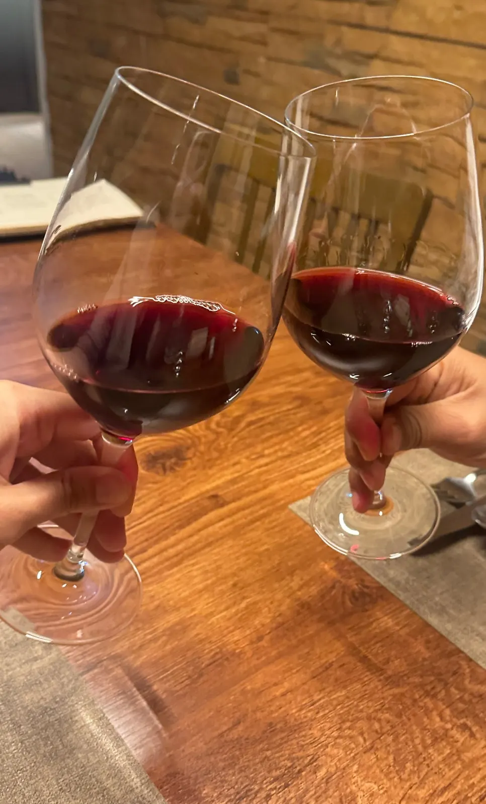 A glass of wine paired with the course meal