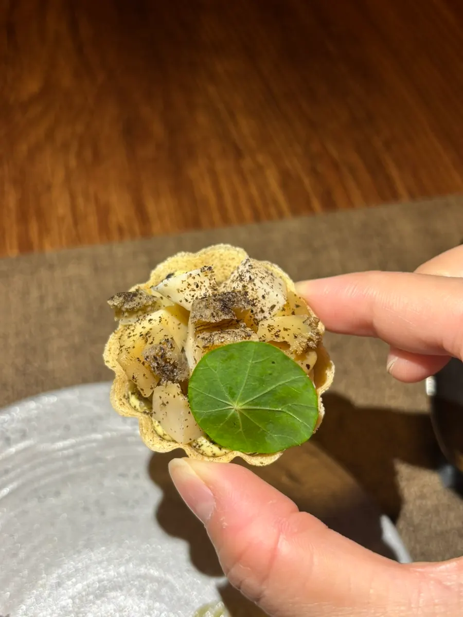 A starter made of chicken liver, abalone, and tofu