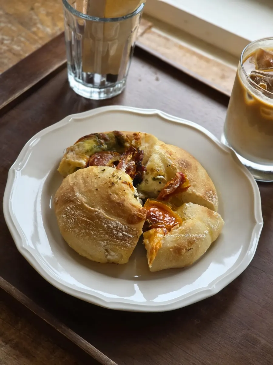 Bread, coffee, and a diary by the window