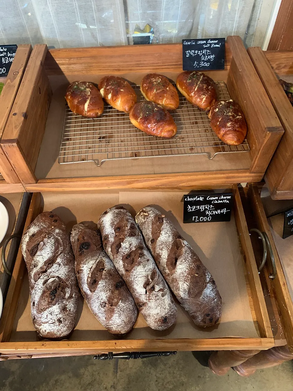 Bakery display of meal-bread style loaves