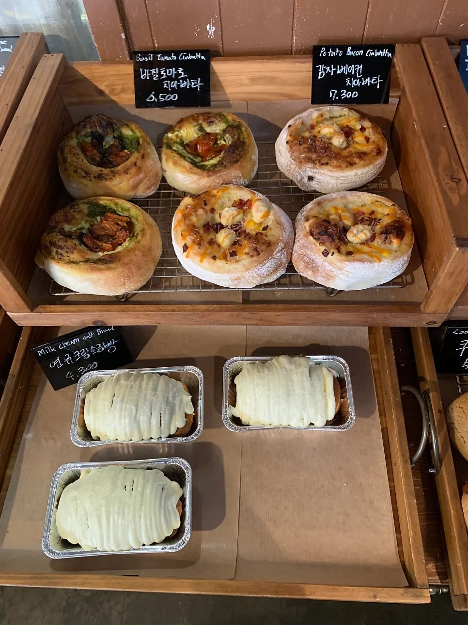 Respire Bakery's bread and brunch menu board
