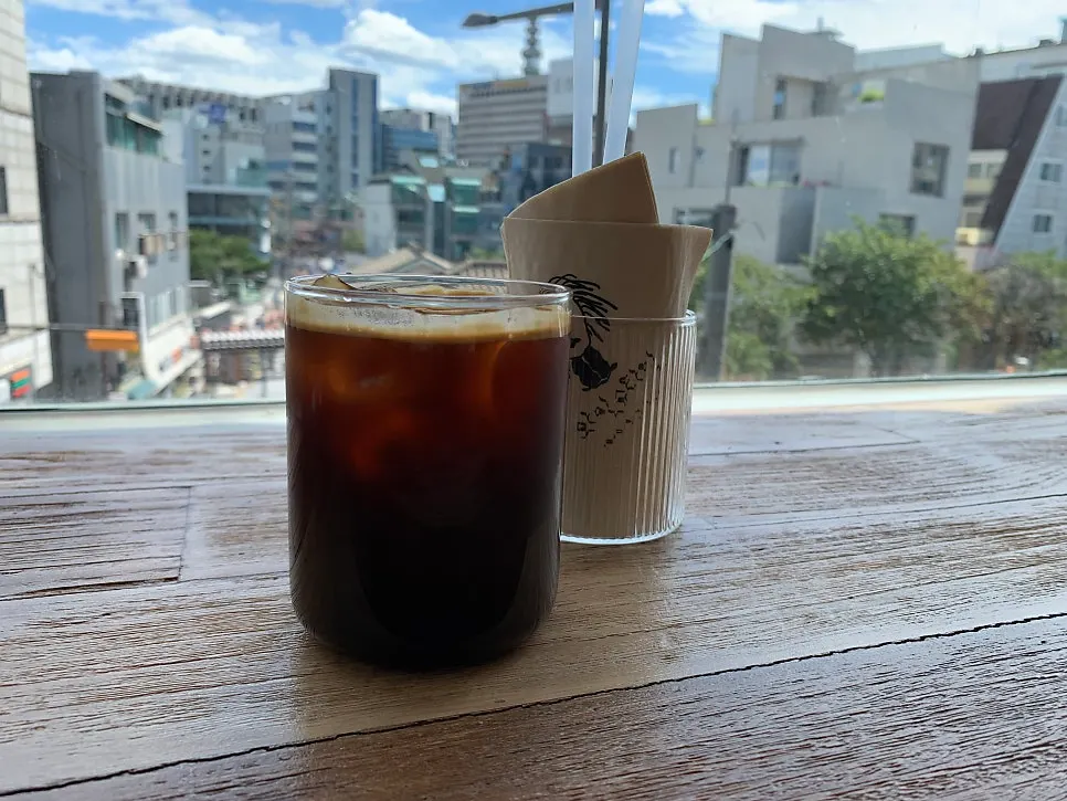 Iced Americano and Coke served first