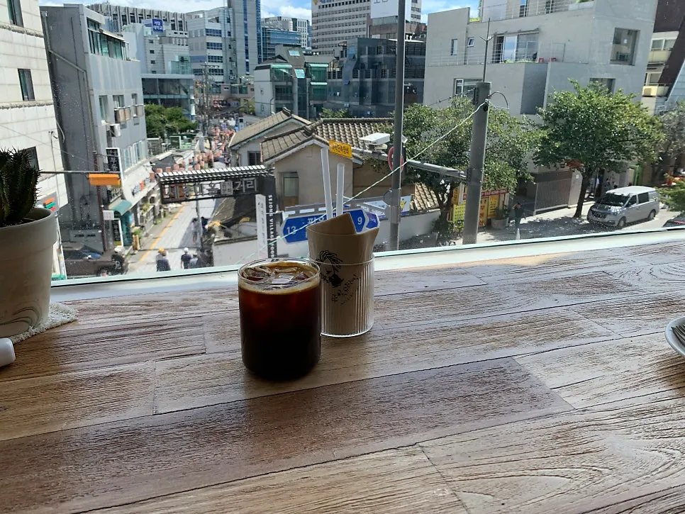 Drinks set on a window-side table